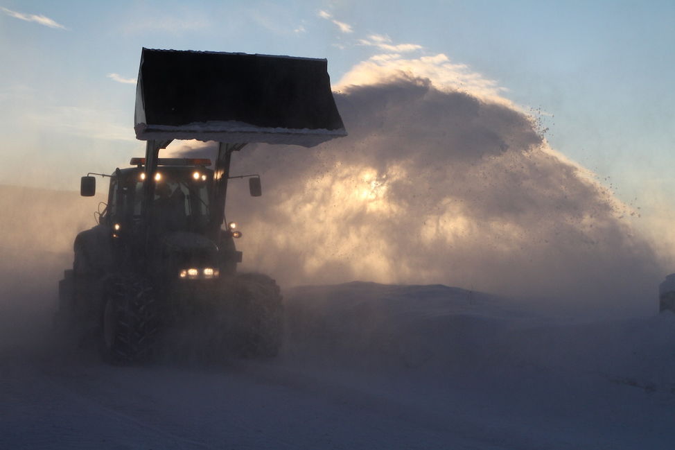snowplowing tractor fresh powdersnow